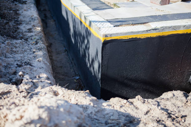 Professional Wet Basement Repair technician working in Sidney, MI